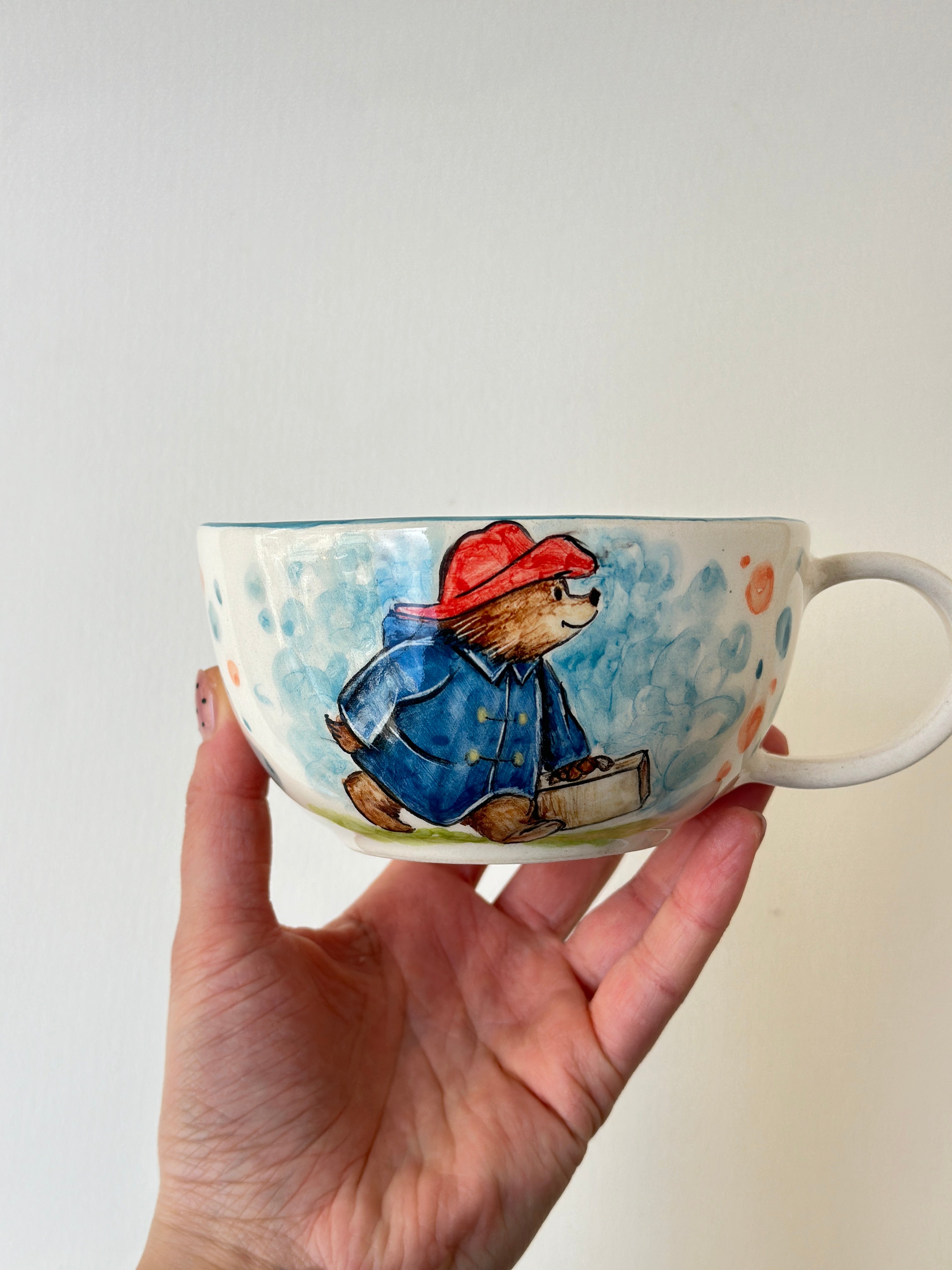 A red padded Bear who loves marmalade handmade mug