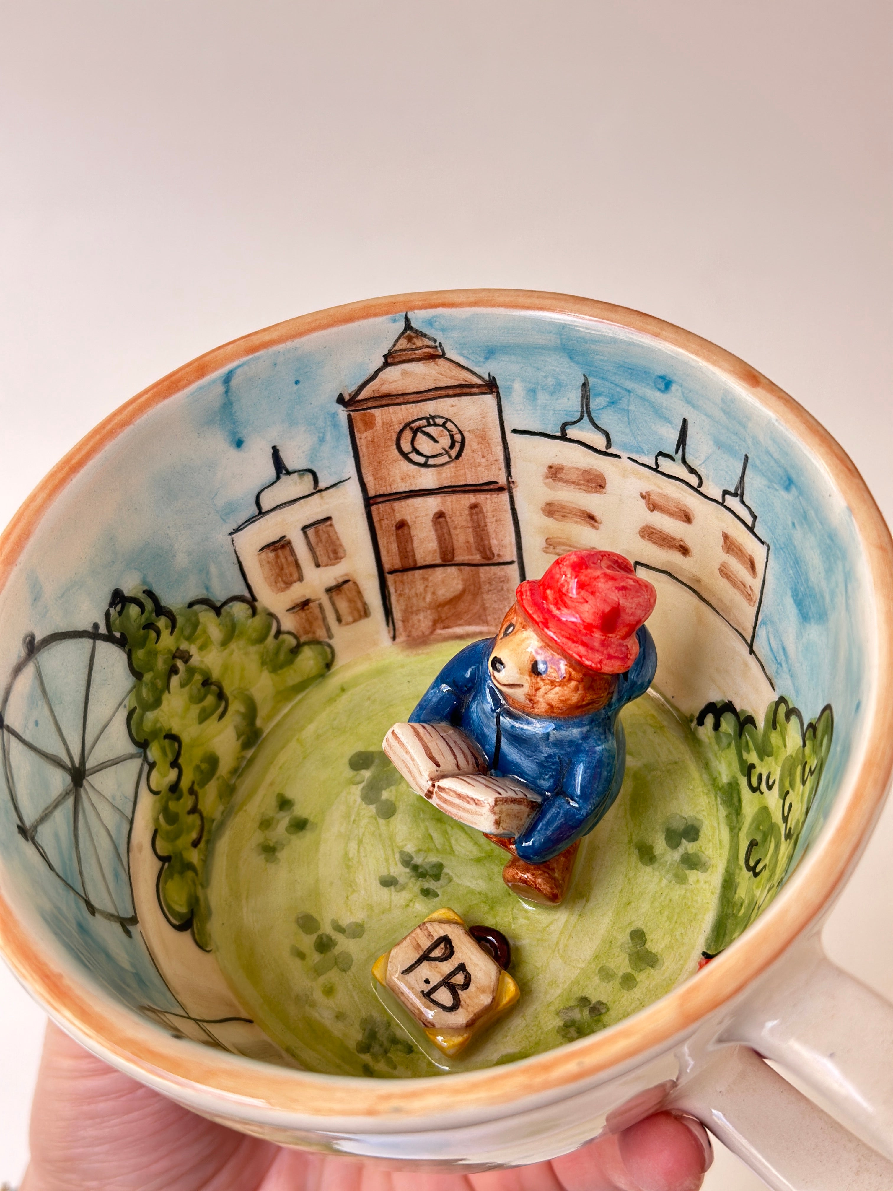 A red padded Bear who loves marmalade handmade mug