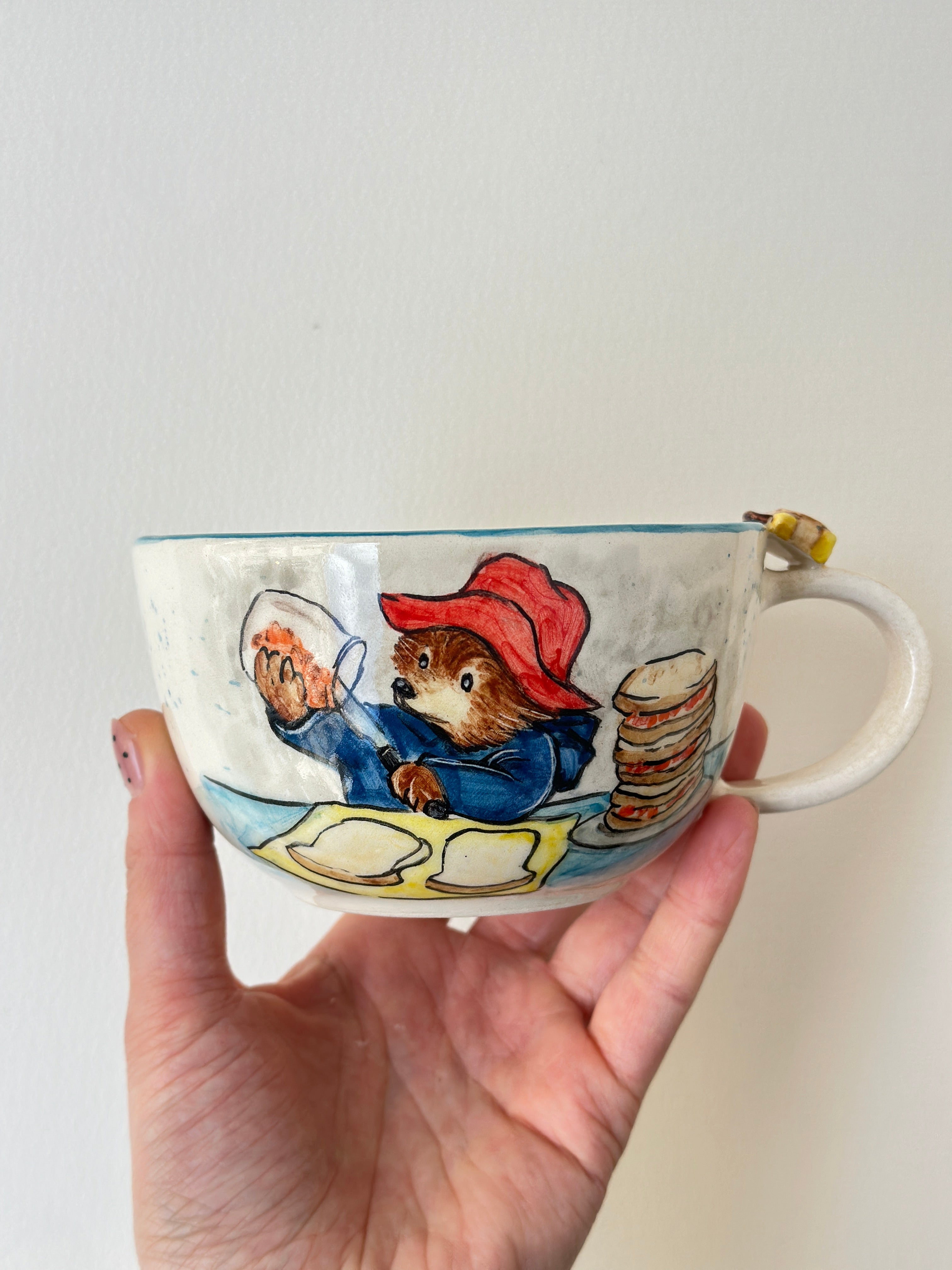 A red padded Bear who loves marmalade handmade mug