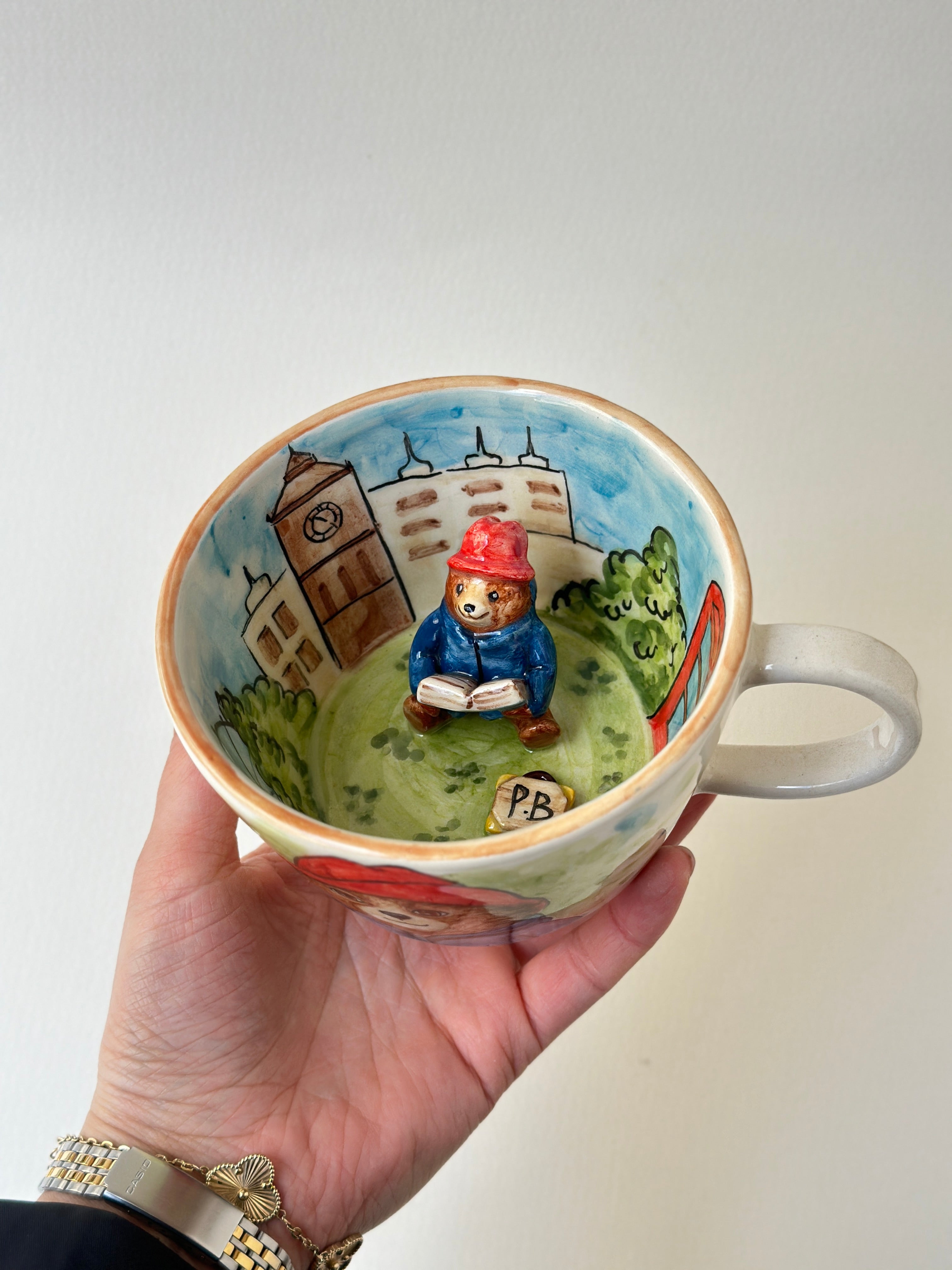 A red padded Bear who loves marmalade handmade mug