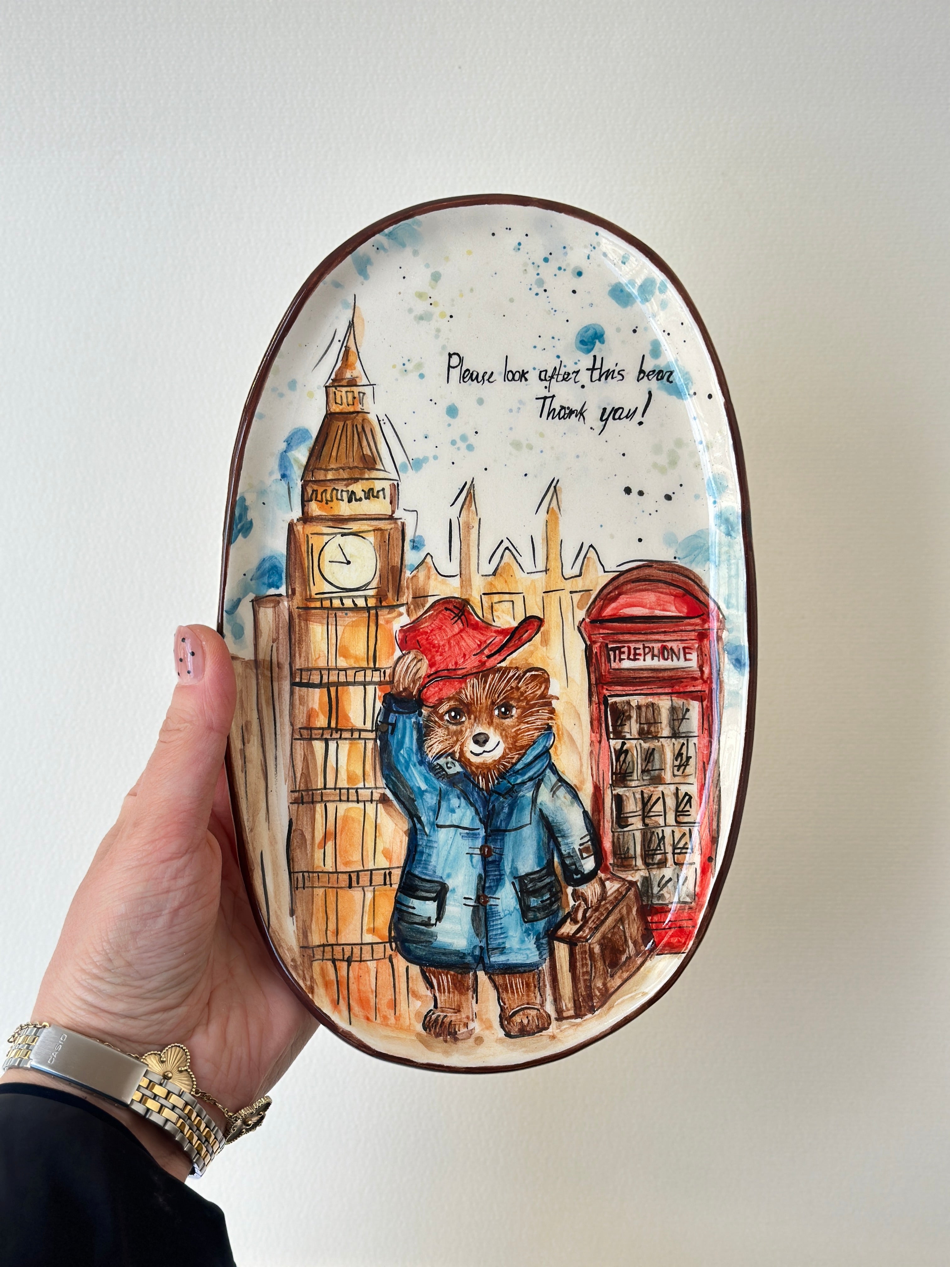 A red padded Bear who loves marmalade handmade plate