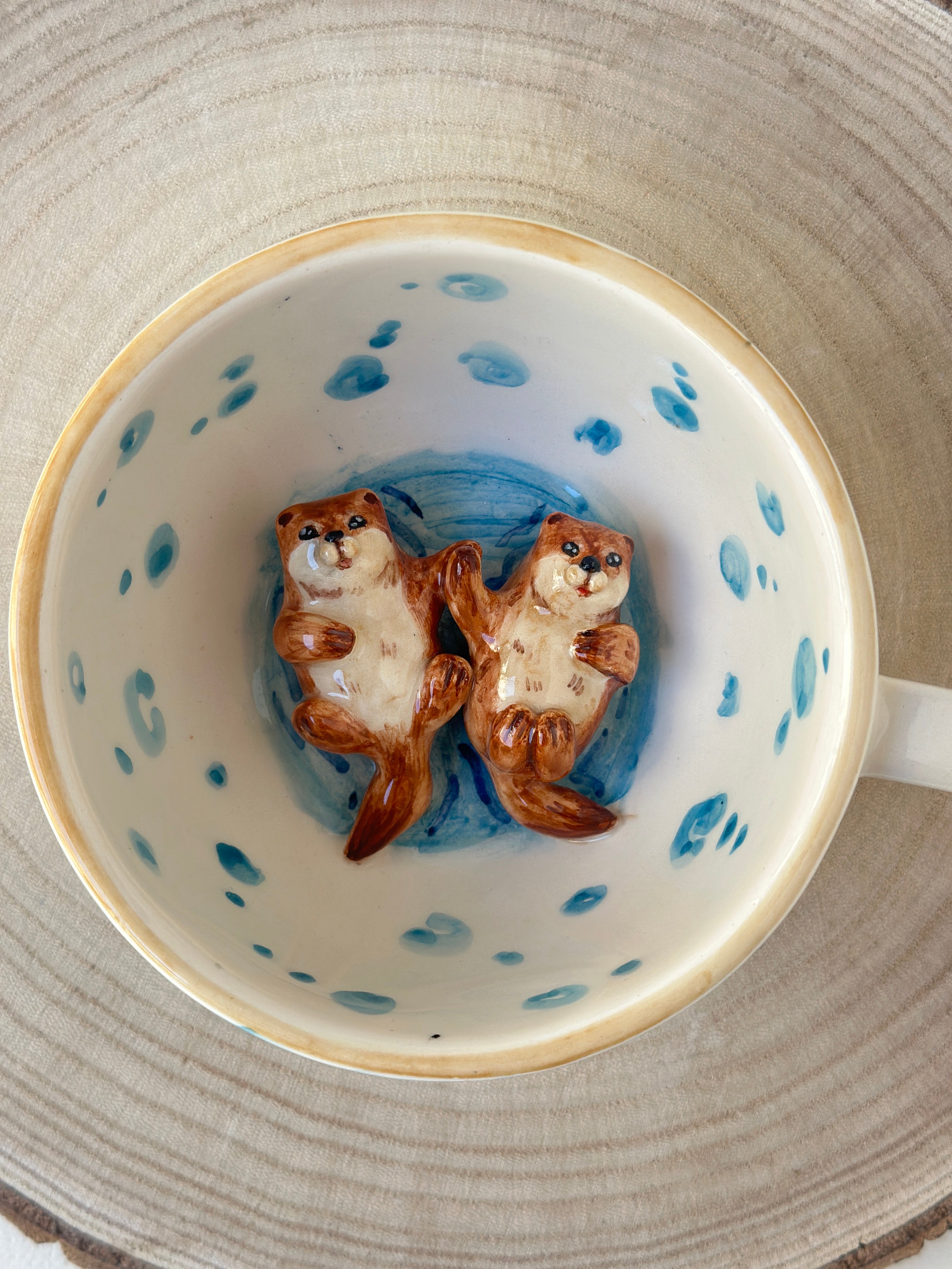 Sea otters handmade mug