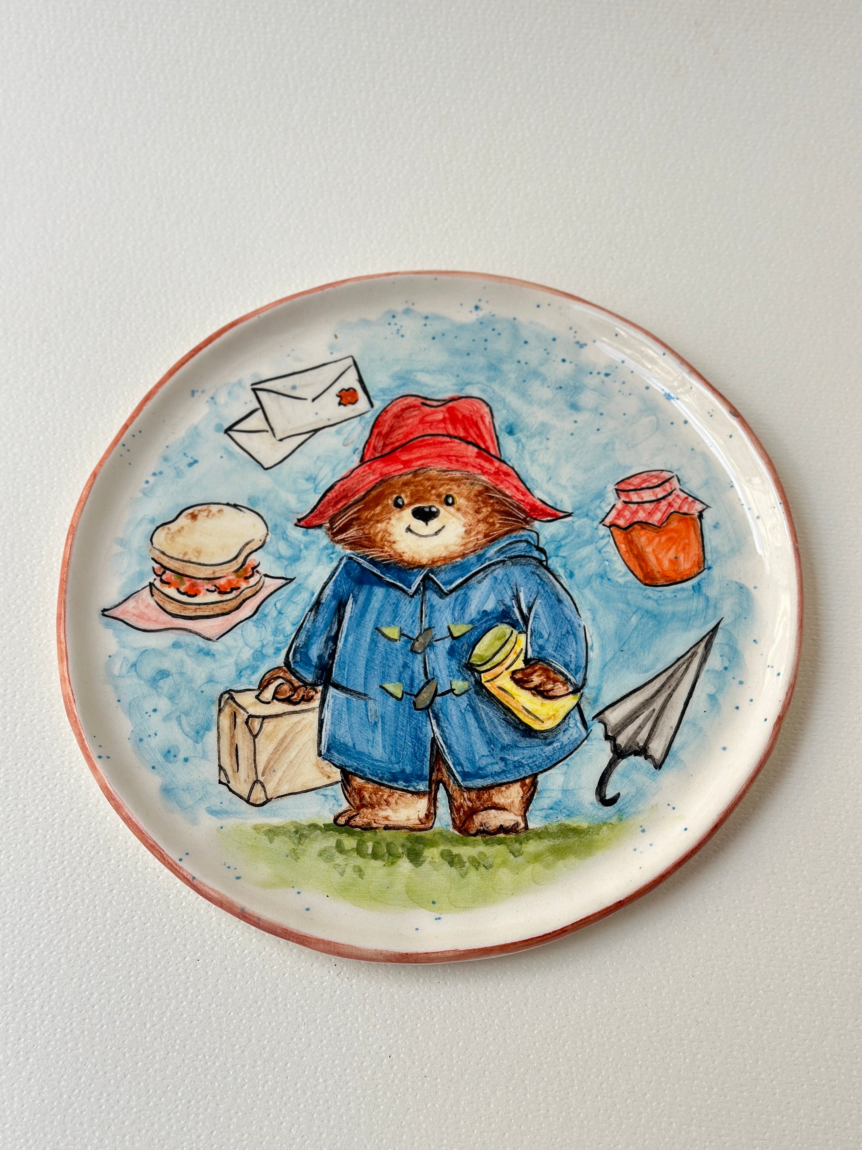 A red- padded Bear who loves marmalade handmade plate