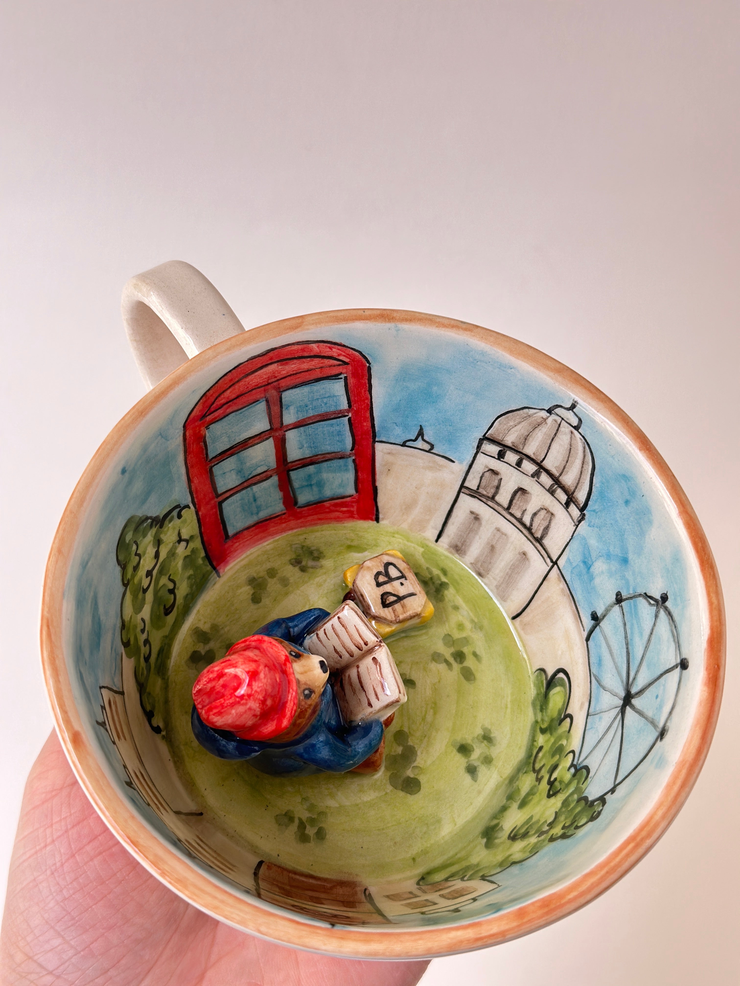 A red padded Bear who loves marmalade handmade mug