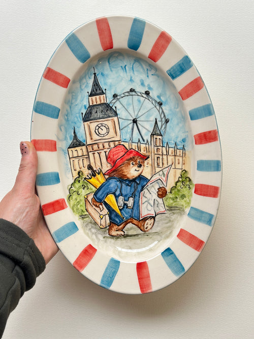 A red padded Bear who loves marmalade handmade plate