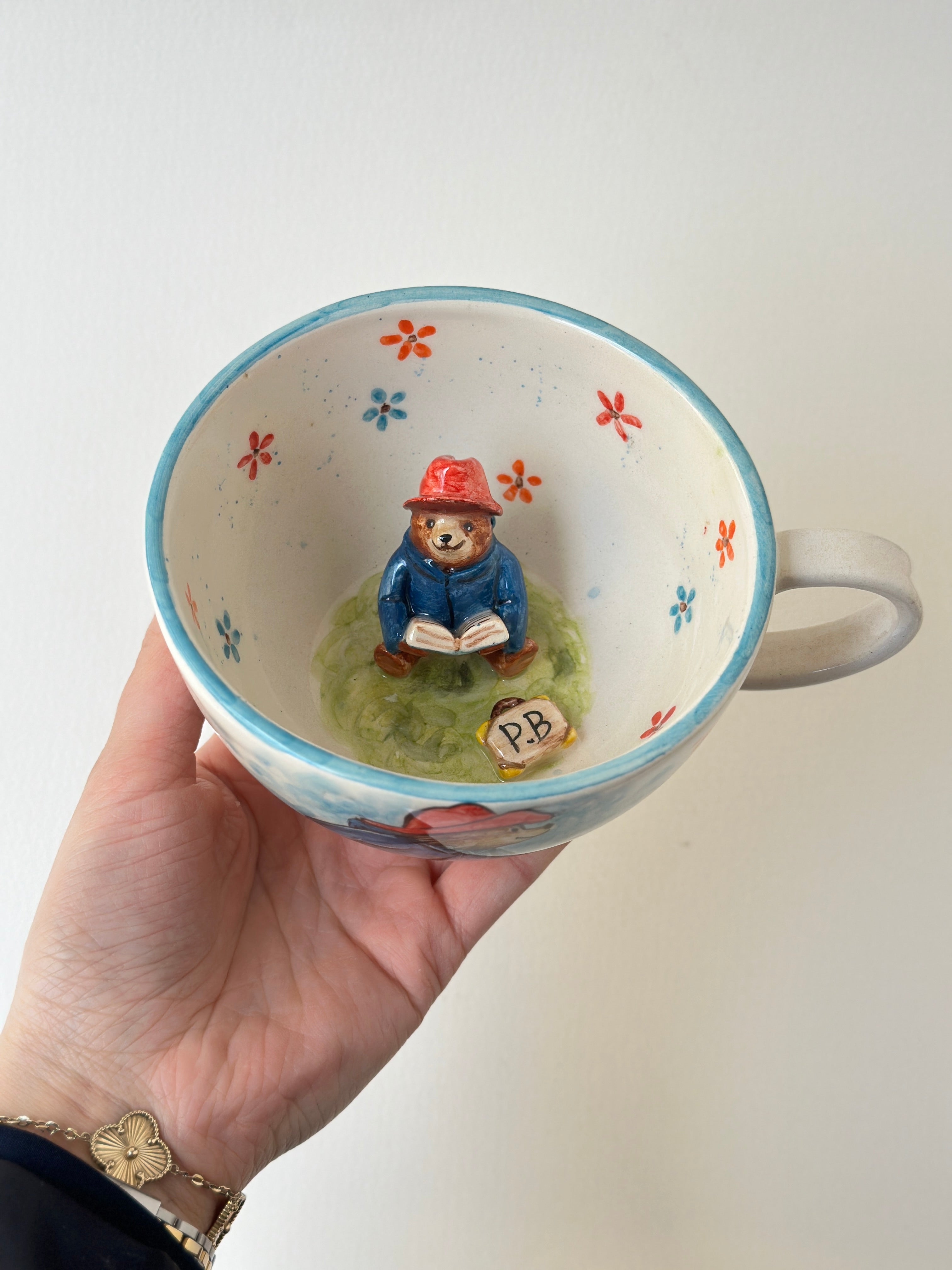 A red padded Bear who loves marmalade handmade mug