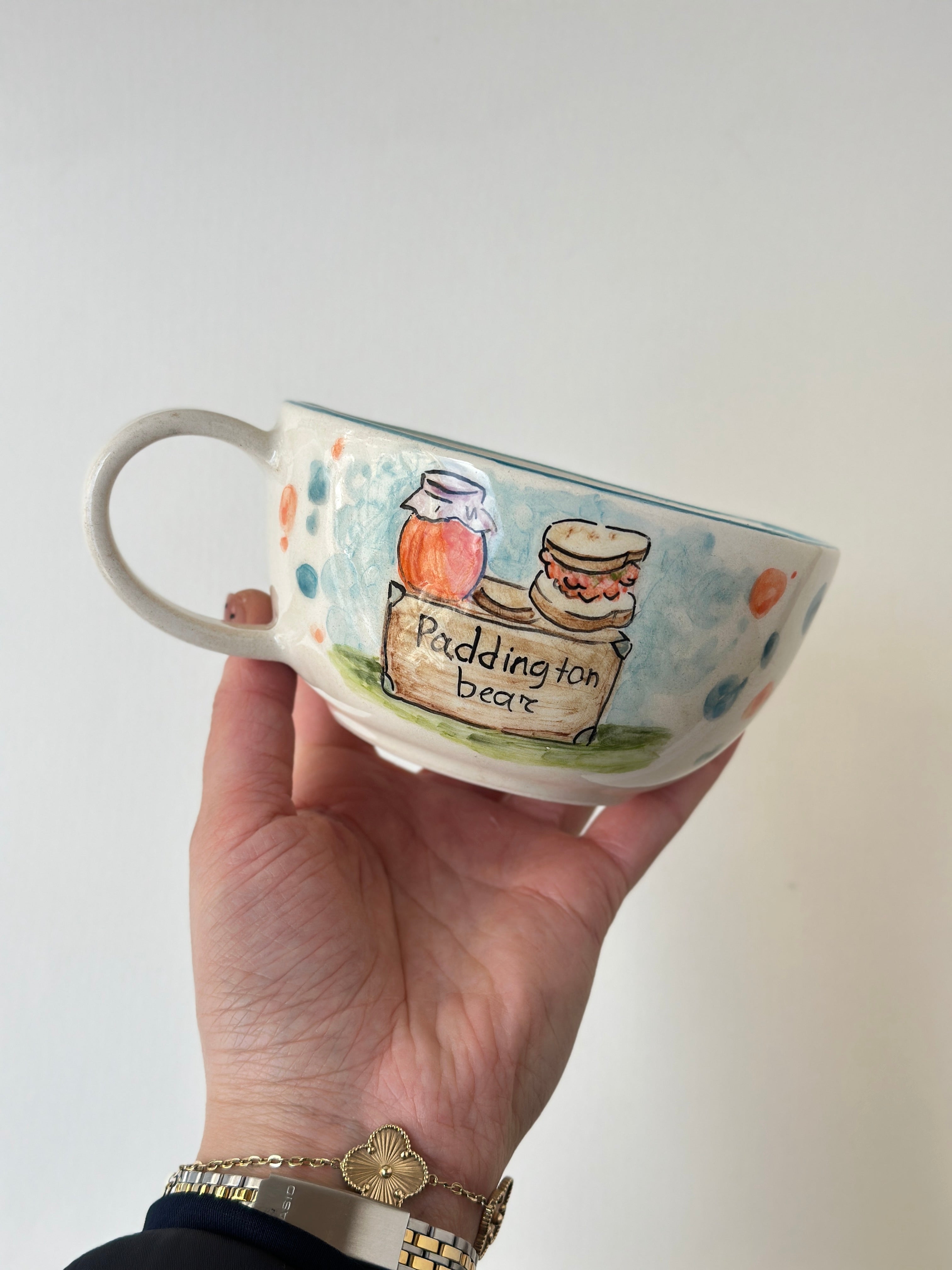 A red padded Bear who loves marmalade handmade mug
