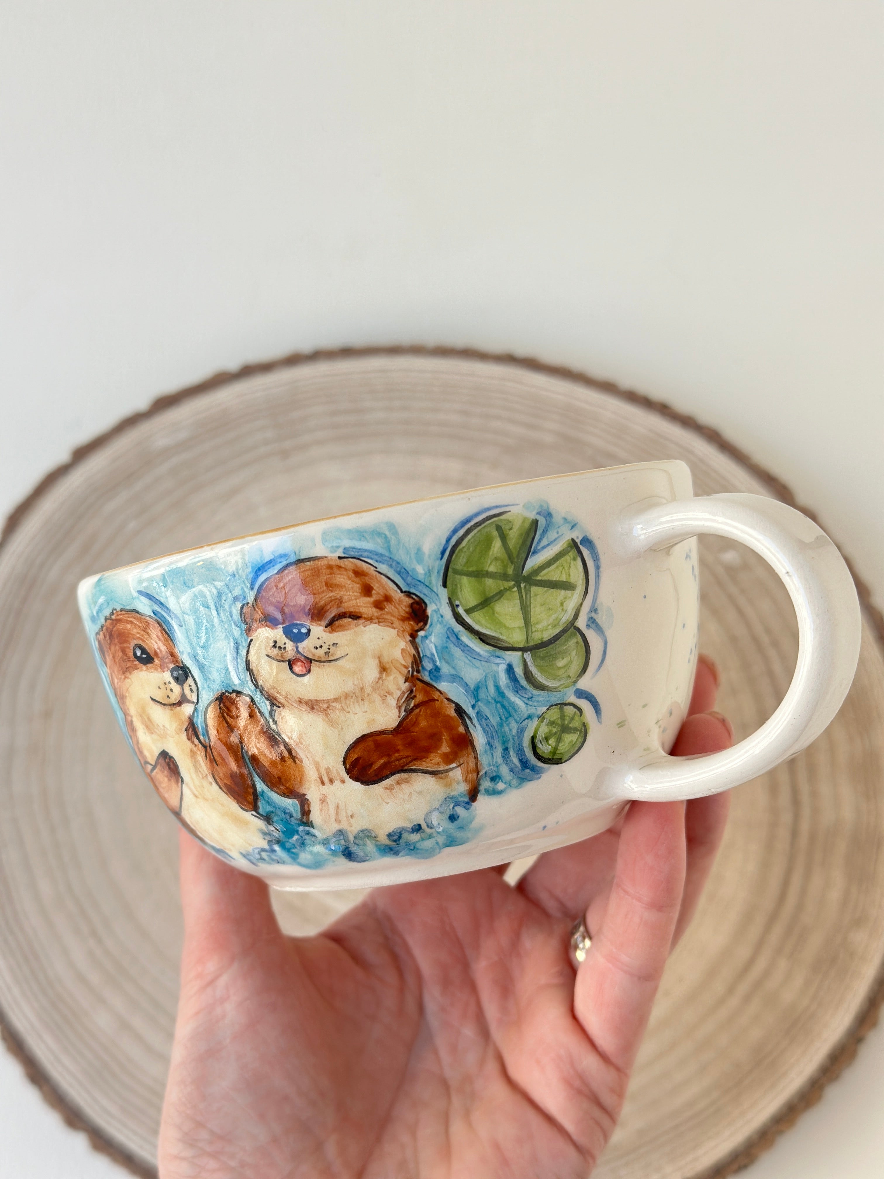 Sea otters handmade mug