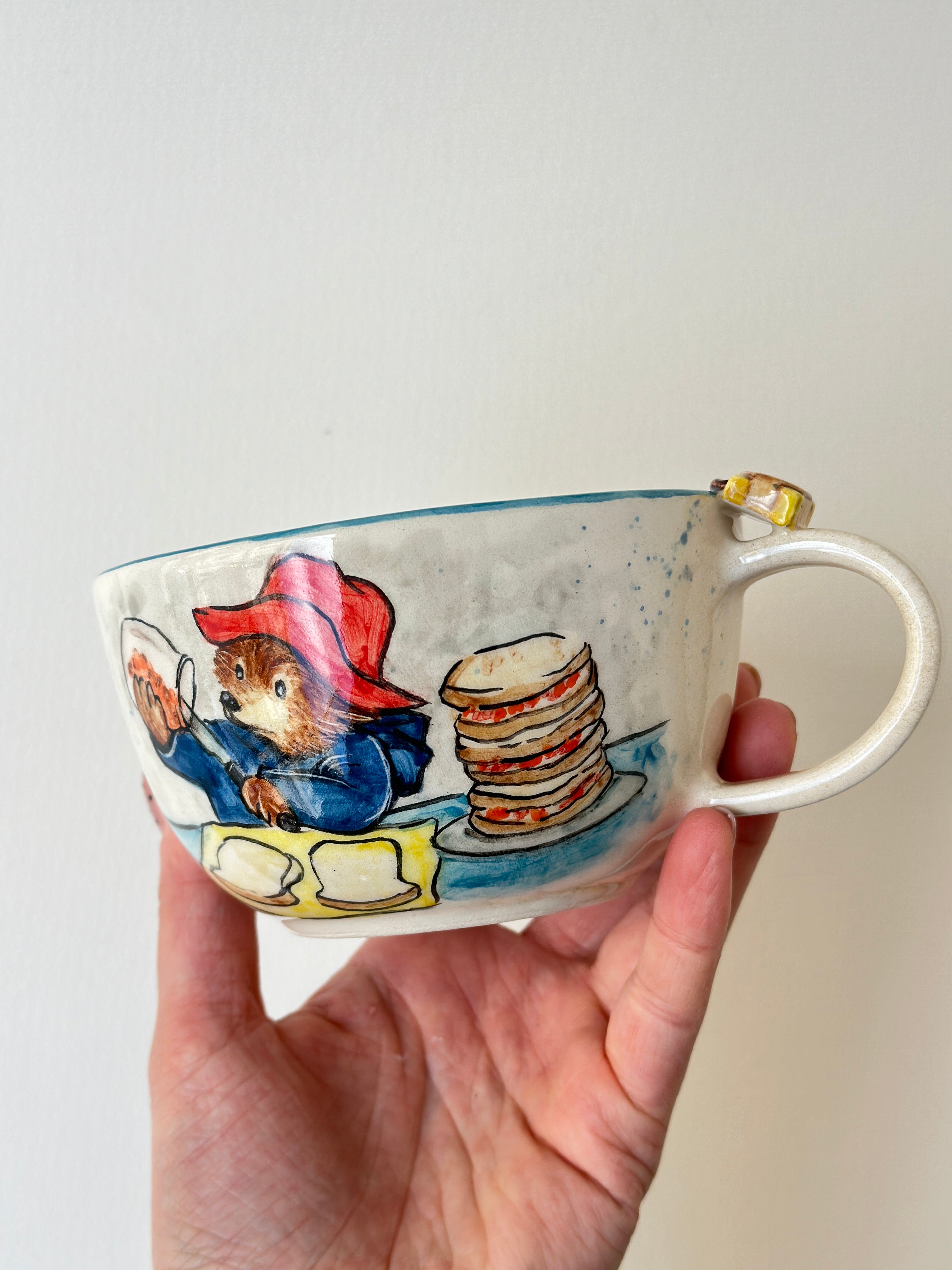 A red padded Bear who loves marmalade handmade mug