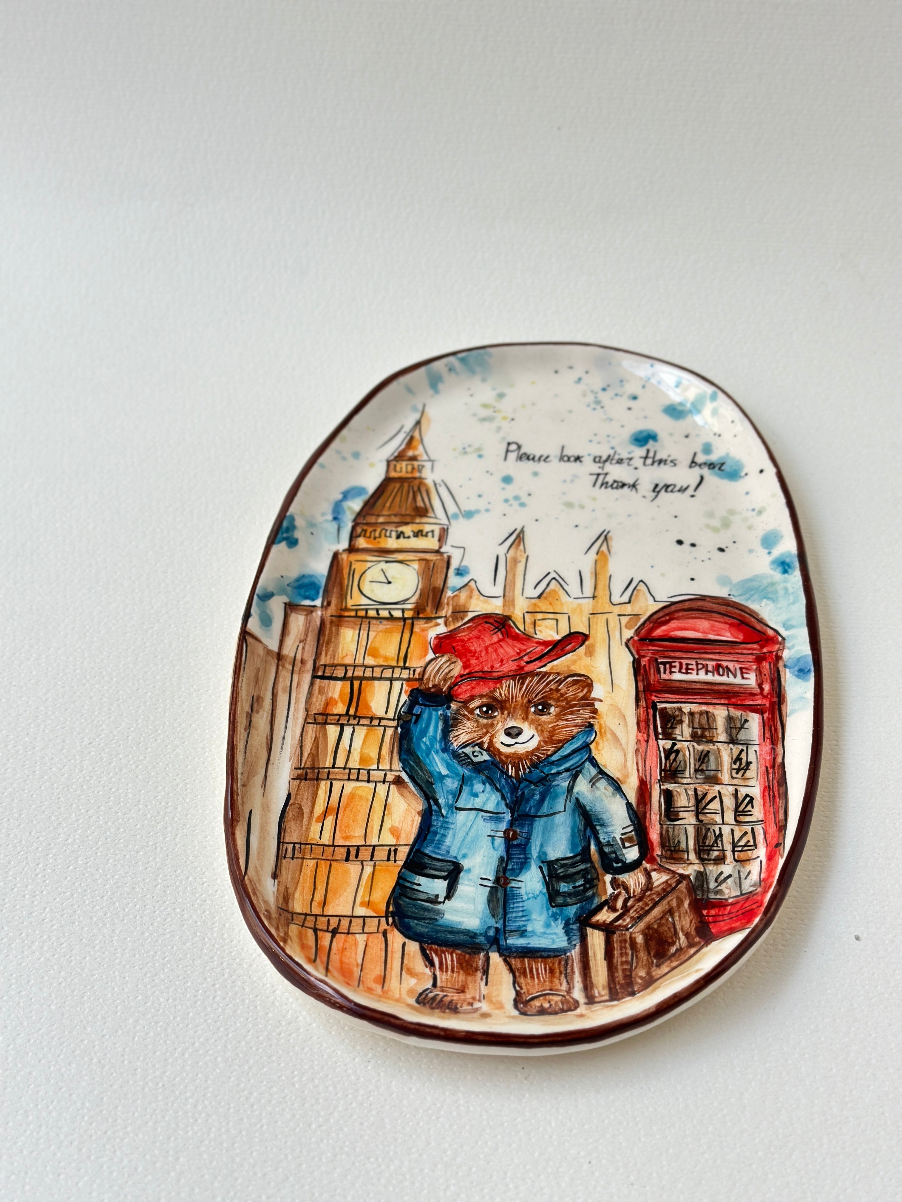 A red padded Bear who loves marmalade handmade plate