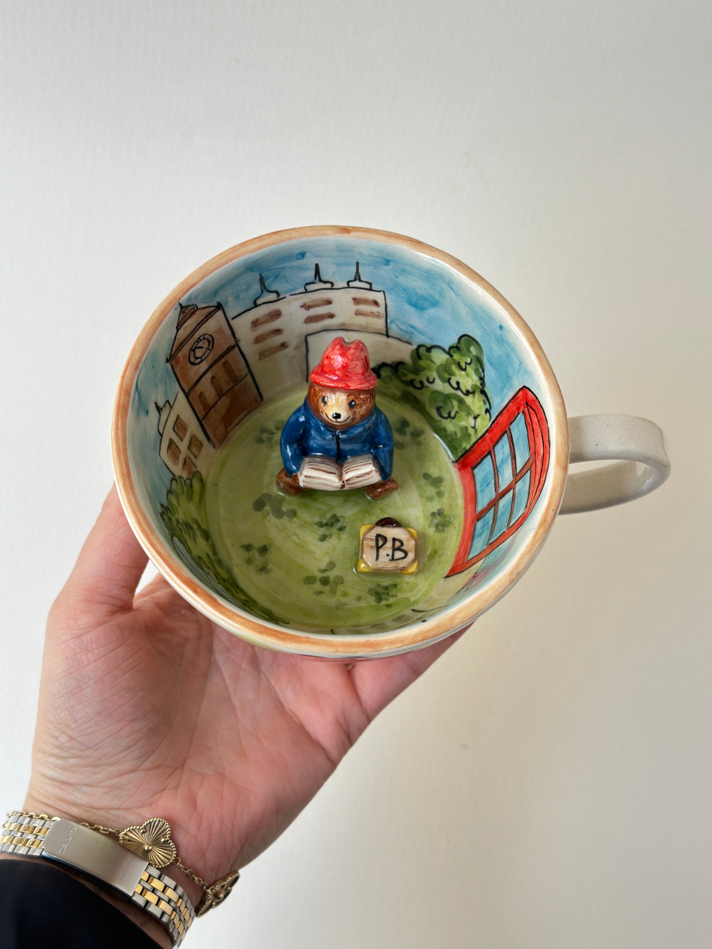 A red padded Bear who loves marmalade handmade mug